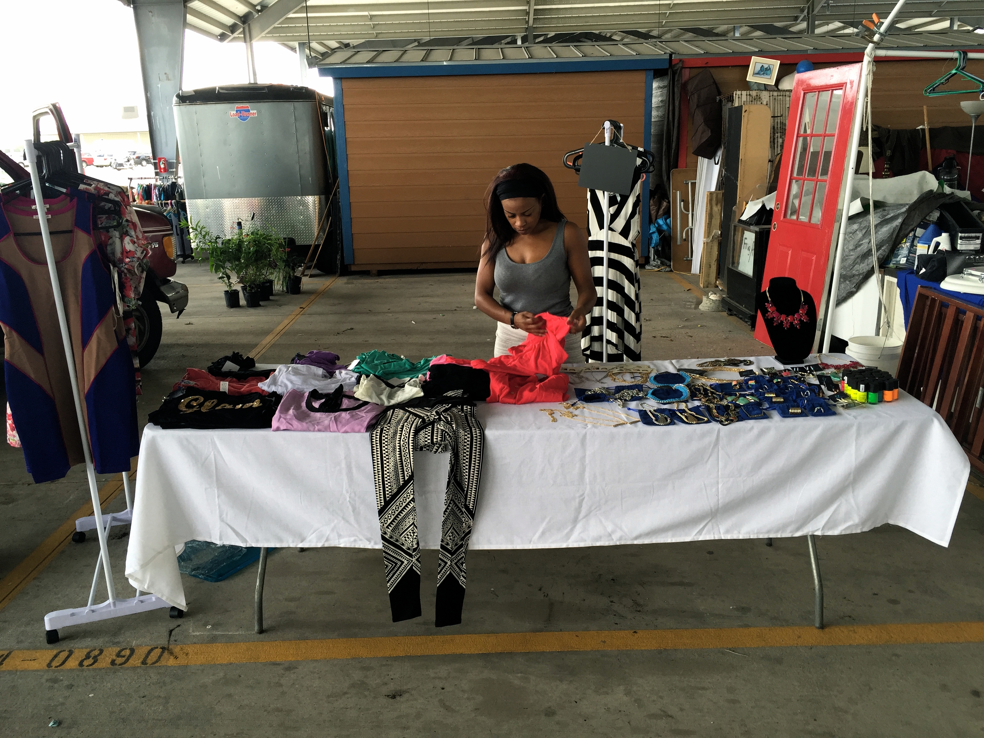picture of selling at a garage sale blue labels boutique