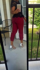 burgunday pants black lace top spiked belt silver shoes