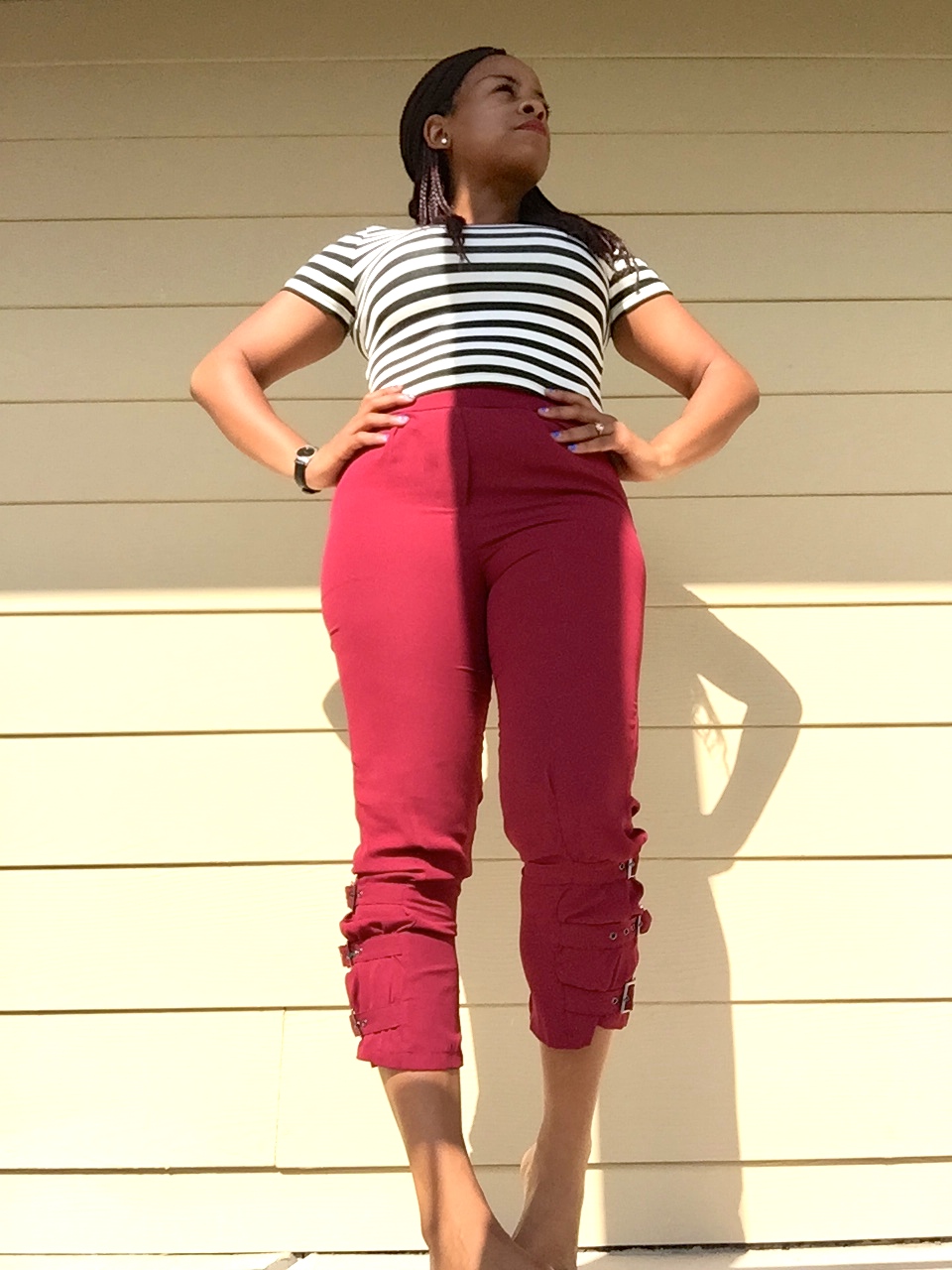 burgundy trousers with black and white striped crop top