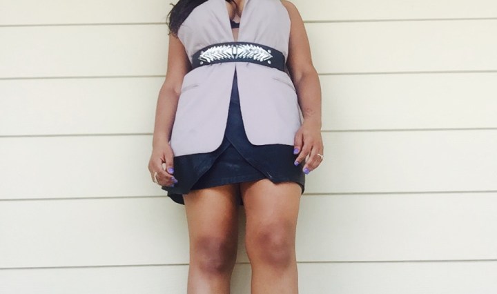 taupe vest, metal belt, black leather wrap skirt, silver heels