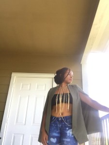 gold body chain olive cape blazer denim cutoffs