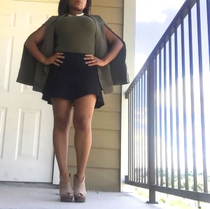 olive cape blazer black mini skirt tan booties gold necklace