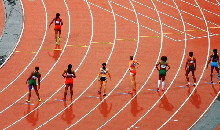 pic of ladies running on track