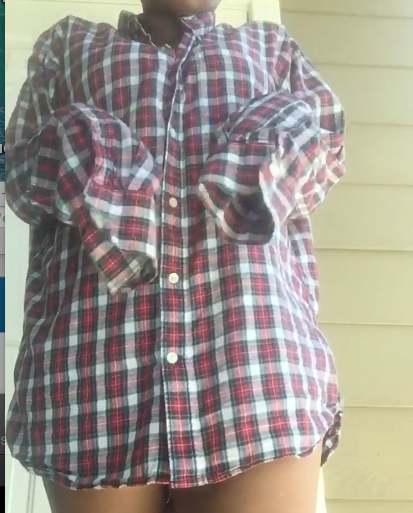 girl wearing an oversized mens shirt