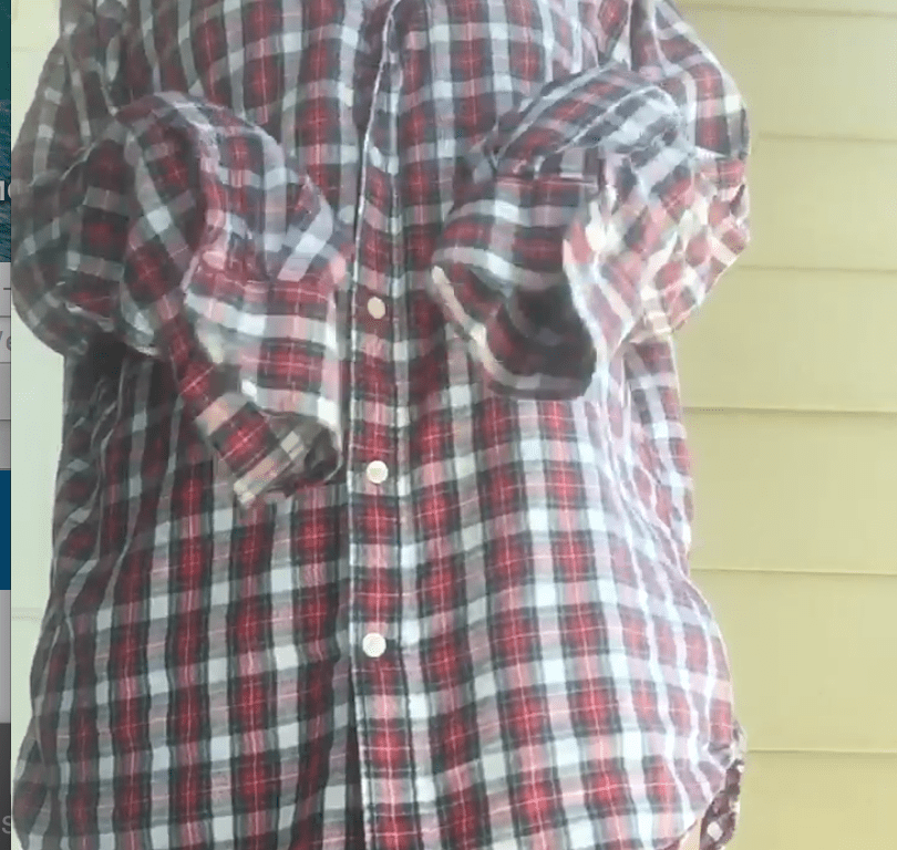 girl wearing an oversized mens shirt