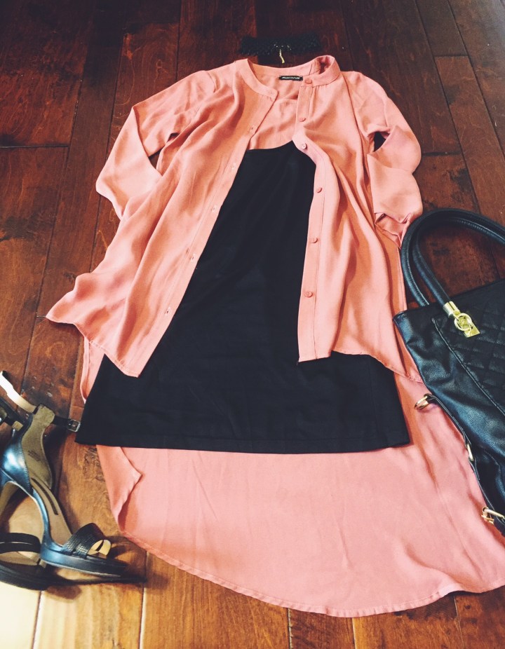 blush top with black cami dress underneath blue labels boutique