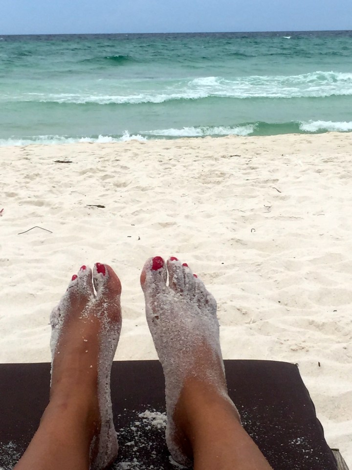 feet lounging at the beach