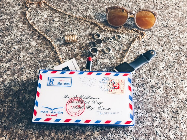 postcard clutch blue labels boutique