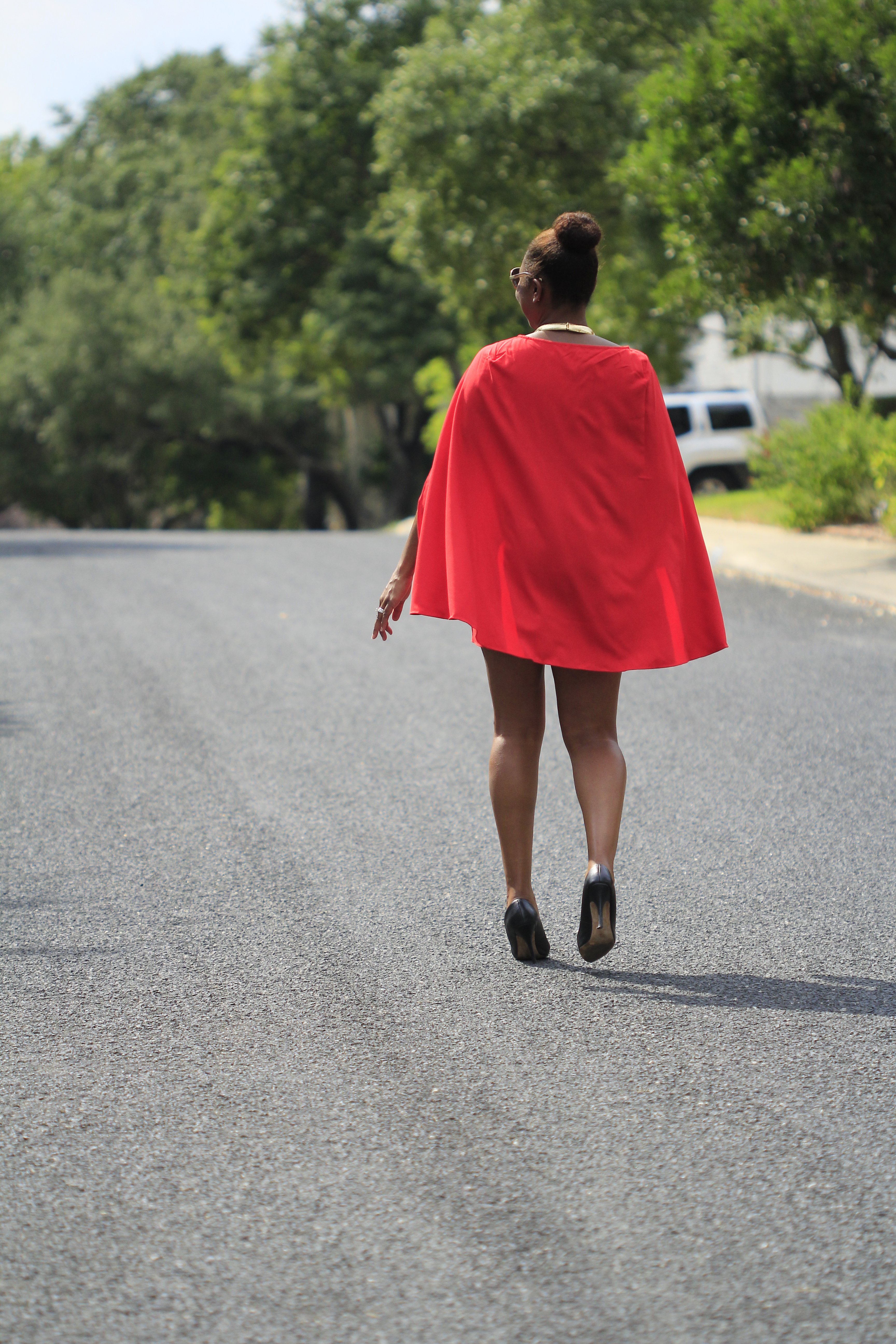 red cape dress from blue labels boutique 