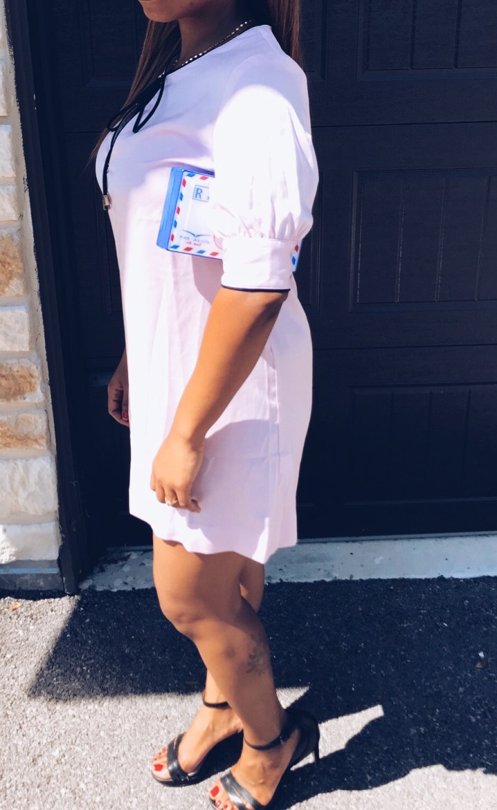 sideview of pajama inspired pink satin dress blue labels boutique