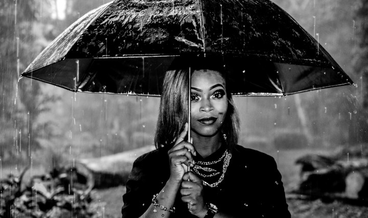 black women under umbrella