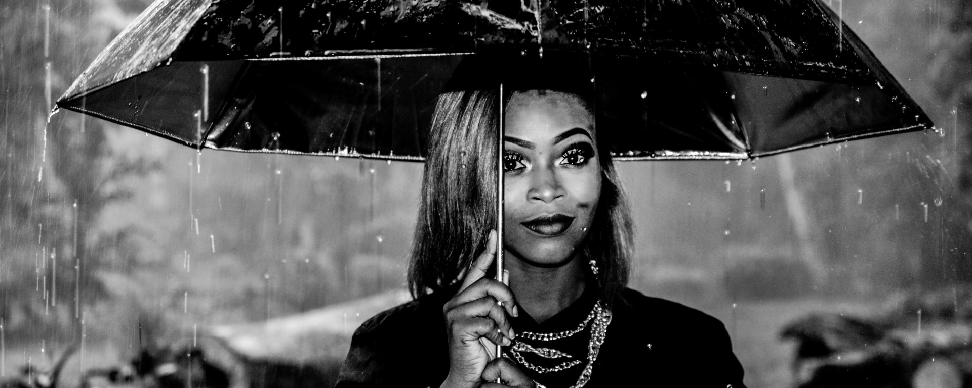 black women under umbrella