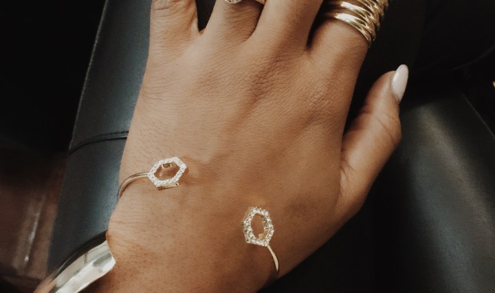 pic of girl wearing gold rings