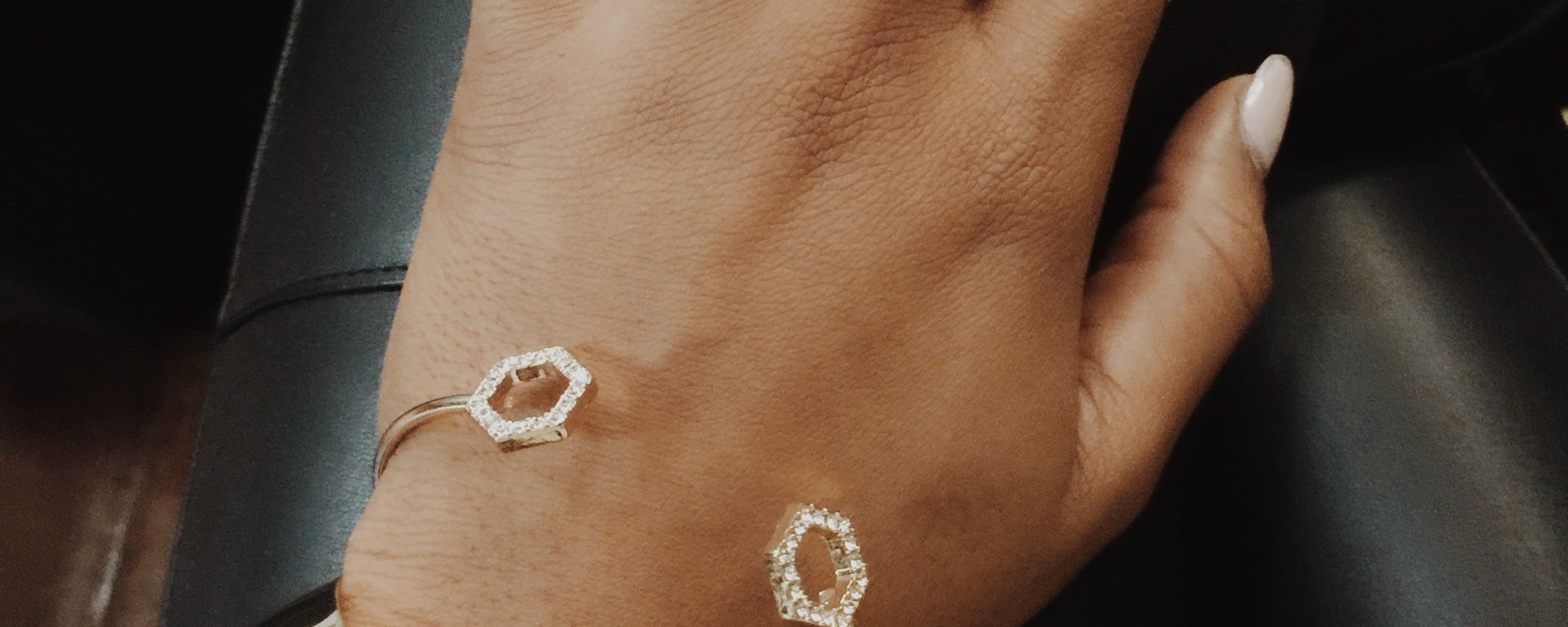 pic of girl wearing gold rings