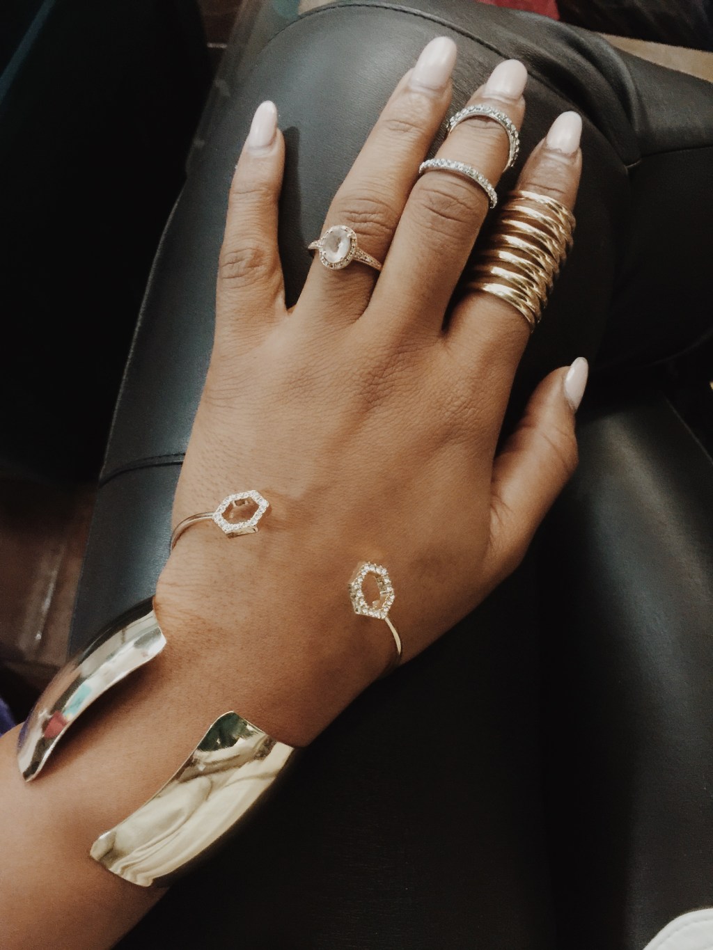 pic of girl wearing gold rings