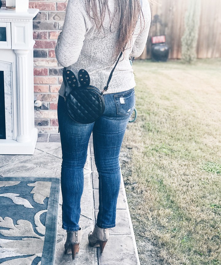 bunny shaped handbag with sweater and denim