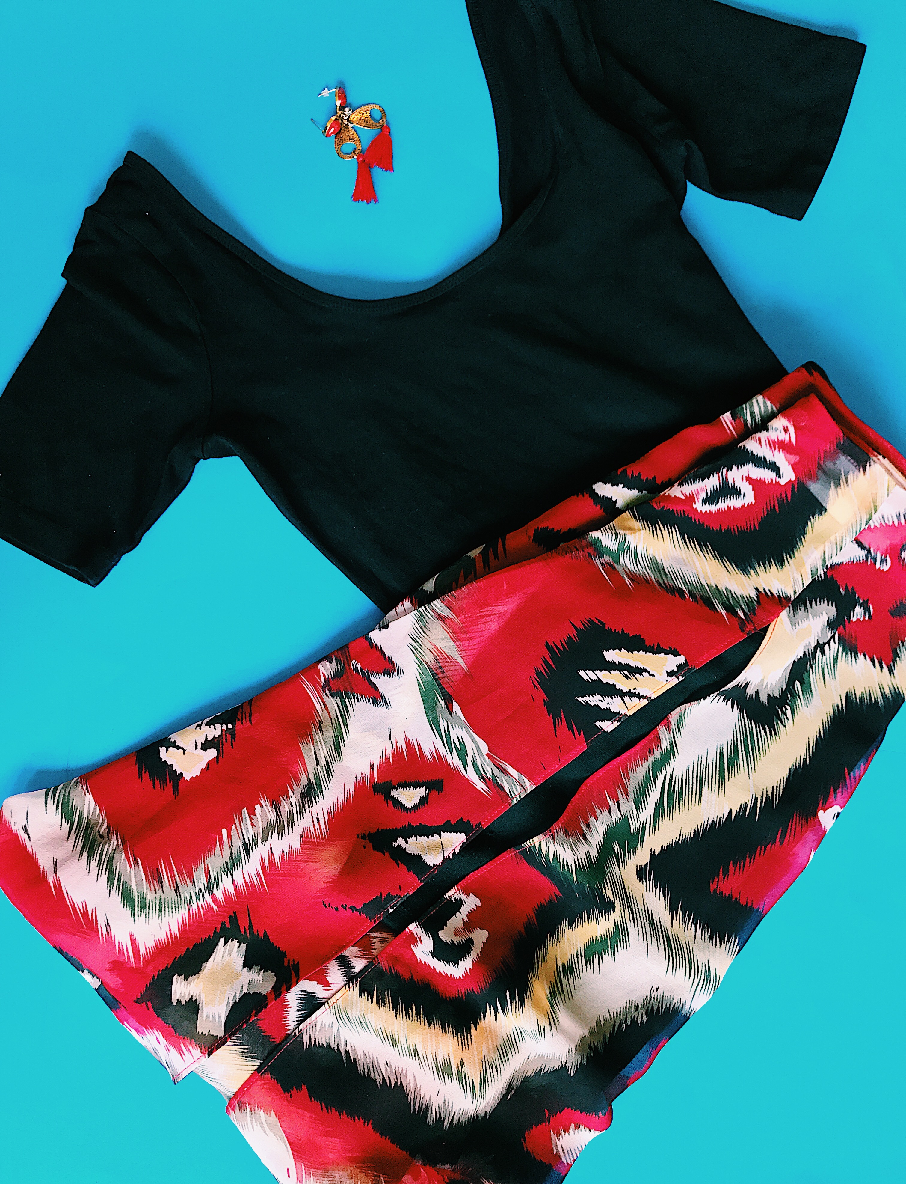 red printed skirt red fringe earrings