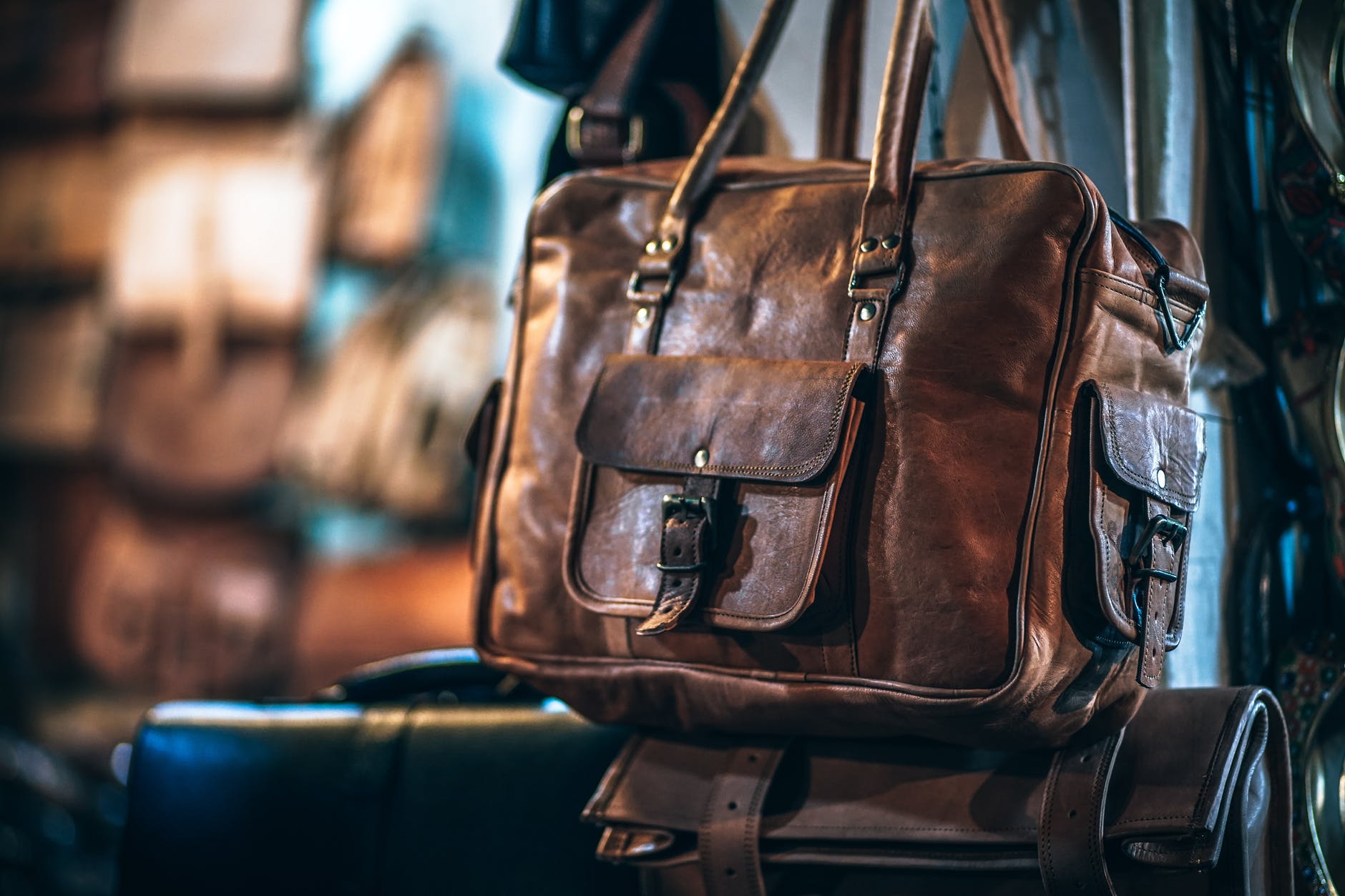 brown leather bag; do you care about a designers background