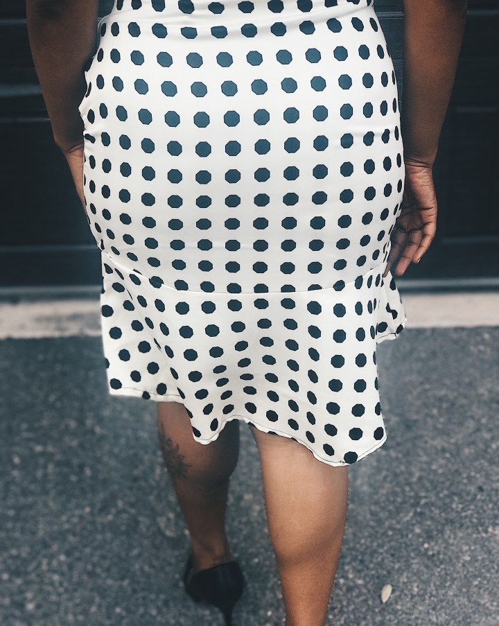 back of polka dot skirt blue labels boutique