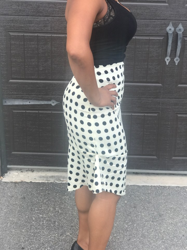 side of polka dot skirt blue labels boutique