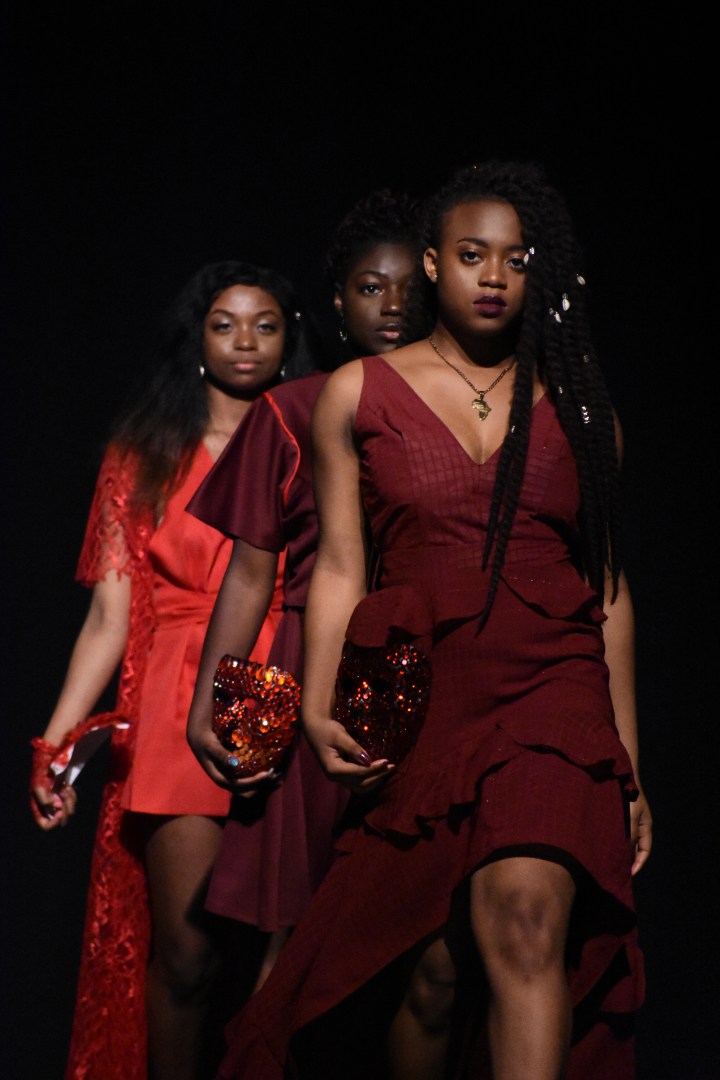 models lined up at runway show