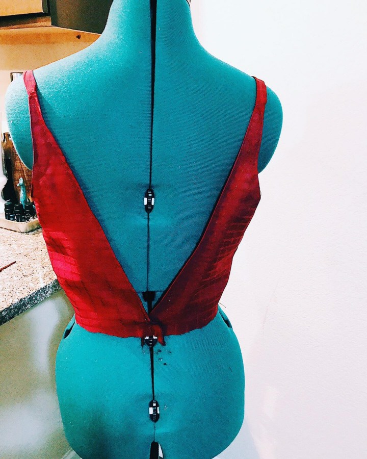 back part of burgundy dress