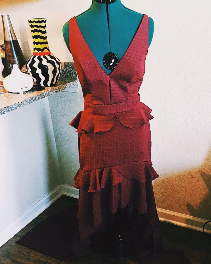 full burgundy dress on mannequin