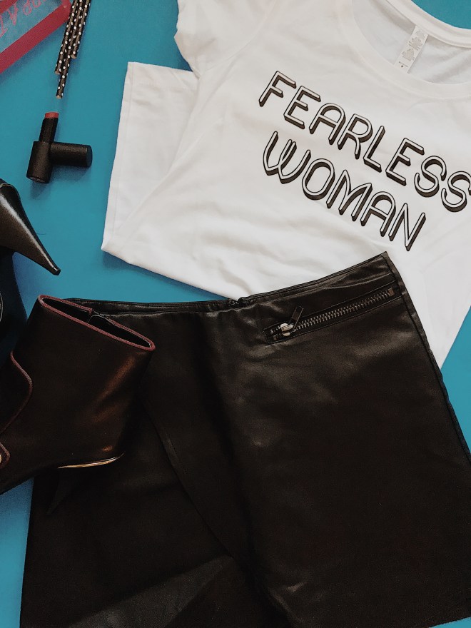 white fearless woman t-shirt, leather wrap skirt 