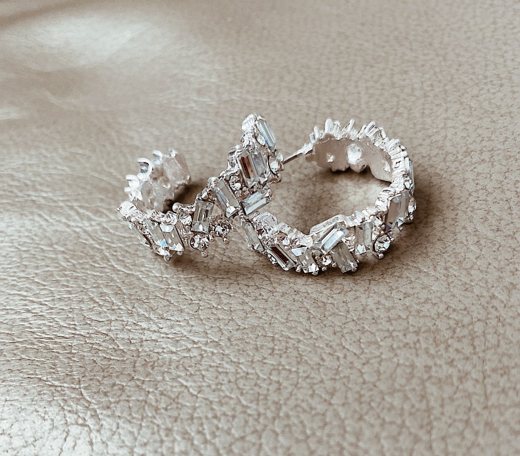 Silver hoop earrings with baguette stones