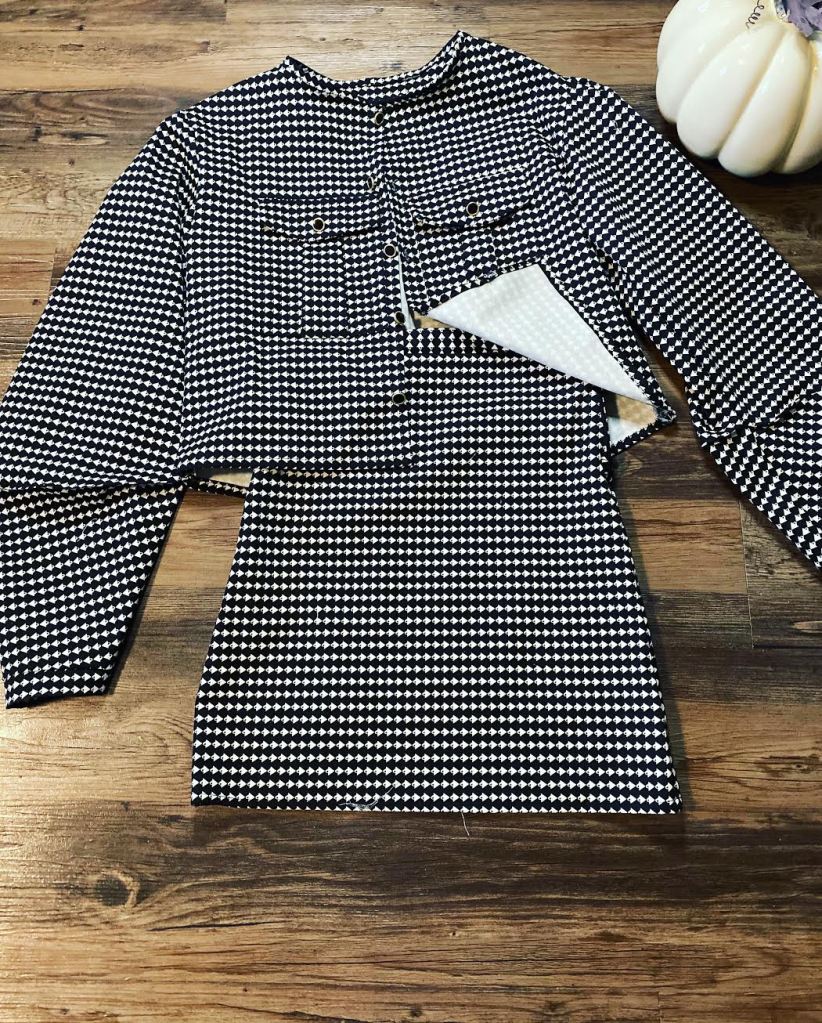 black and ivory jacket and skirt set 