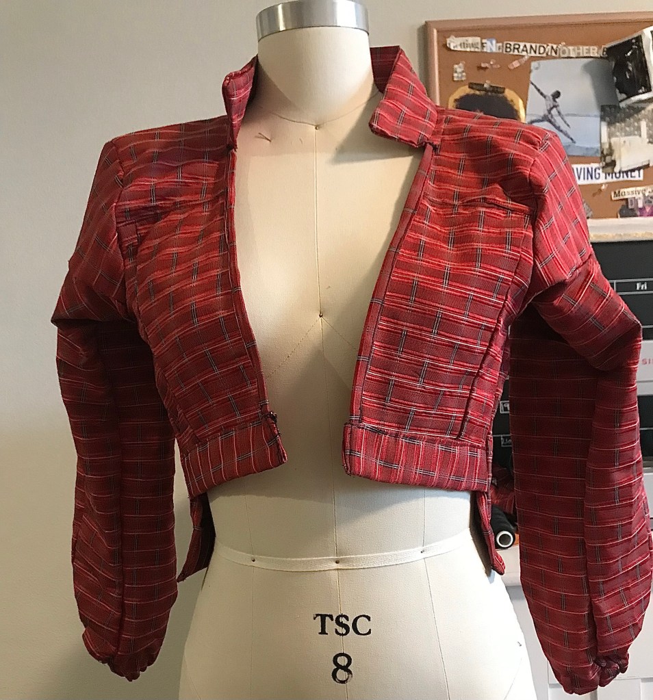 Red woman’s handmade jacket 